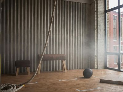Industrial style gym with brick walls